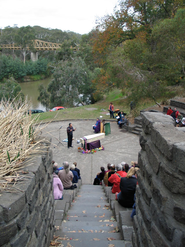 Max plays flute, through amphitheatre stepswell t