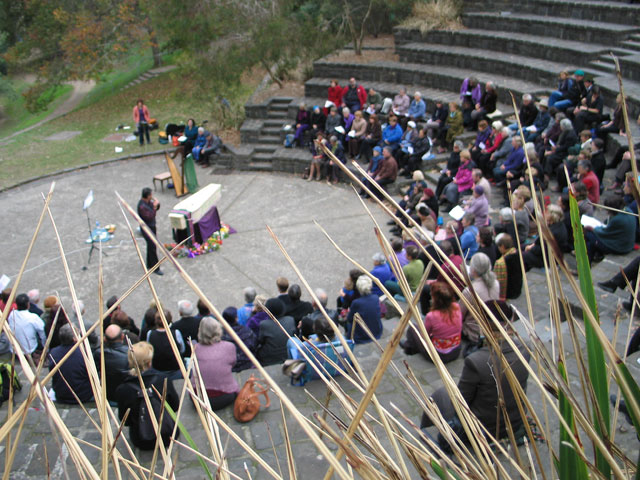 Max plays through reeds audience soft focus